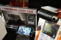 The F750 Thinkware dashboard mounted camera is pictured on display at the International Consumer Electronics show (CES) in Las Vegas, Nevada January 4, 2015. According to Thinkware, the dashboard camera monitors and records driving incidents with built-in FCWS (Frontal Collision Warning System) capabilities. REUTERS/Rick Wilking