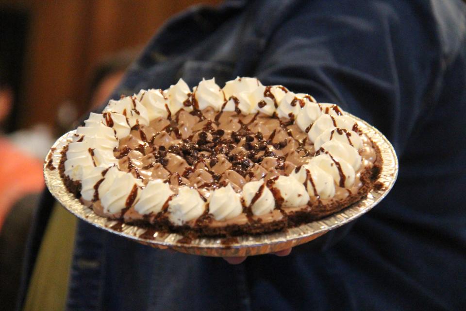 A pie is displayed before being thrown in the face of the Big Boom Bracket Battle Grand Finale Duo winner. The event was held at the end of the Perry Chamber's annual dinner on Tuesday, April 5, 2022, at La Poste.