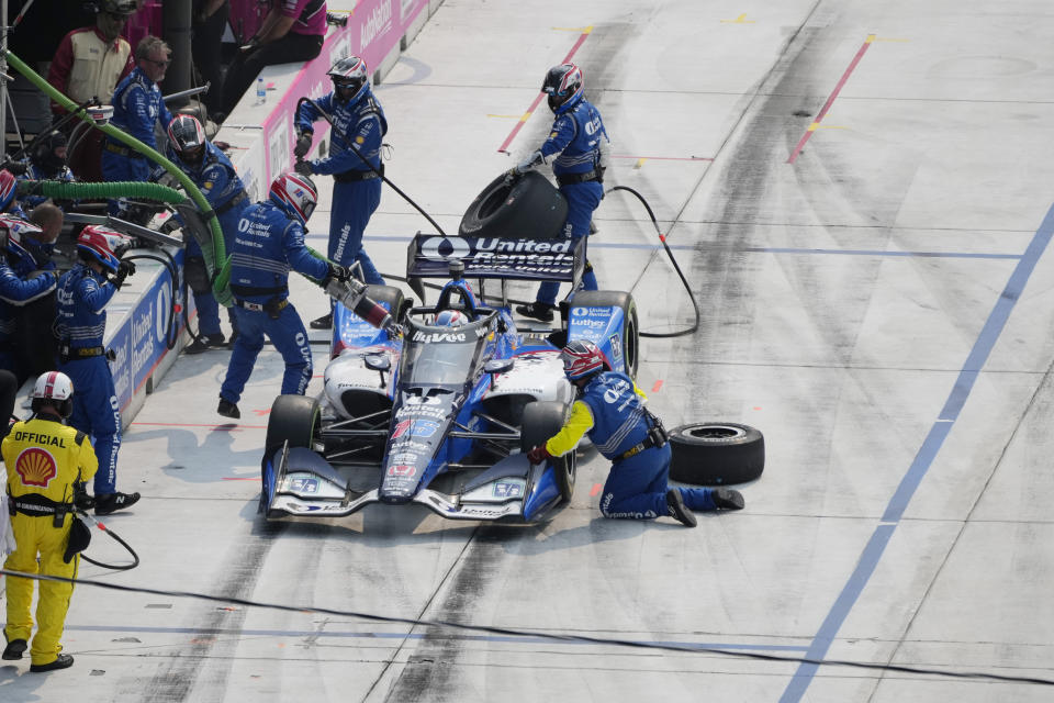 Graham Rahal makes a pitstop during the IndyCar Detroit Grand Prix auto race, Sunday, June 4, 2023, in Detroit. (AP Photo/Carlos Osorio)