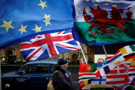 Flags flutter outside the Houses of Parliament, after Prime Minister Theresa May's Brexit deal was rejected, in London, Britain, January 16, 2019. REUTERS/Henry Nicholls