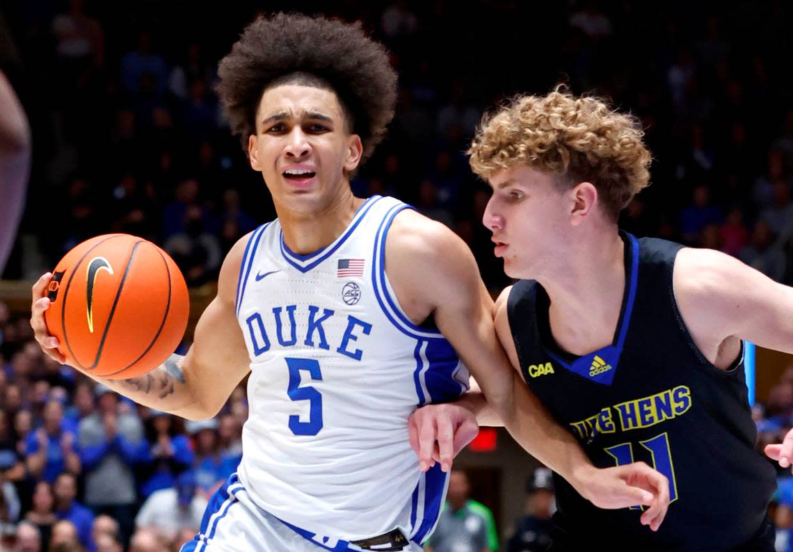 Duke’s Tyrese Proctor (5) drives past Delaware’s Cavan Reilly (11) during the first half of Duke’s game against Delaware at Cameron Indoor Stadium in Durham, N.C., Friday, Nov. 18, 2022.