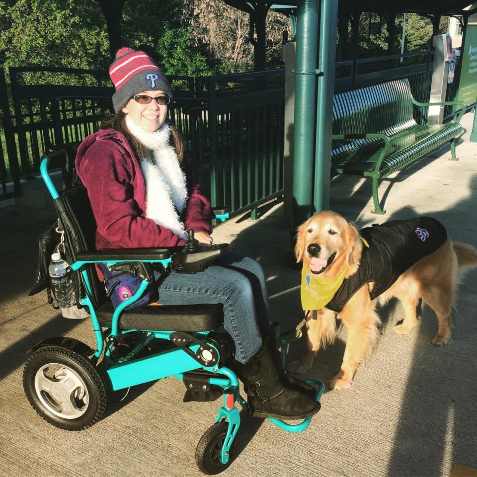 Blair Hagelgans and her service dog Creed.