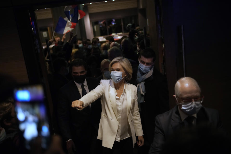 Valerie Pecresse, candidate for the French presidential election 2022, arrives to deliver a speech during a meeting in Paris, France, Saturday, Dec. 11, 2021. The first round of the 2022 French presidential election will be held on April 10, 2022 and the second round on April 24, 2022. (AP Photo/Christophe Ena)
