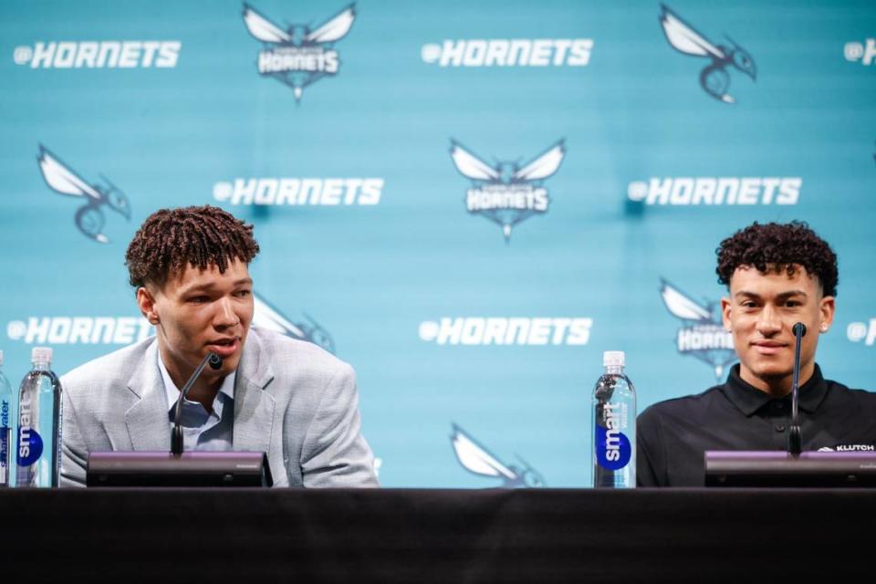 The Hornets’ 2024 NBA Draft picks, Tidjane Salaün, left, and KJ Simpson, are introduced during a press conference at Lowe’s Tech Hub in Charlotte on Friday, June 28, 2024.