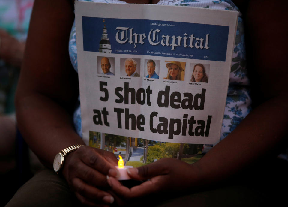 Five people were killed in the attack after police say the suspect, who had a long-standing grudge against the paper, opened fire in the Capital Gazette newsroom. (Photo: Leah Millis / Reuters)