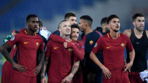 Soccer Football - Champions League - Roma vs Qarabag - Stadio Olimpico, Rome, Italy - December 5, 2017 Roma players watch the stadium screen awaiting full-time in the Chelsea vs Atletico Madrid group game REUTERS/Alberto Lingria