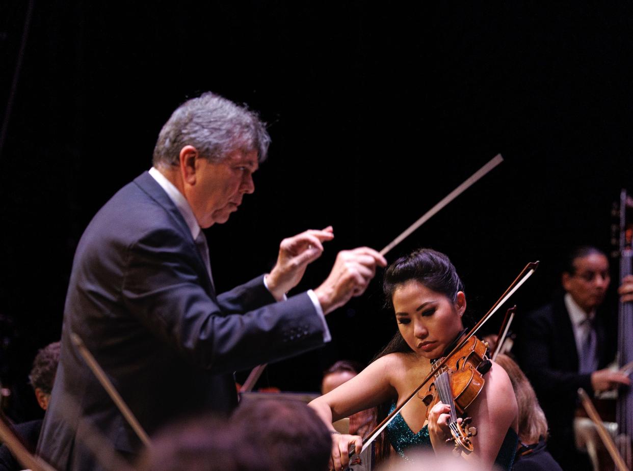 Conductor Gerard Schwarz and guest violinist Sarah Chang perform in Palm Beach Symphony's season-opening concert on Sunday.