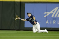Seattle Mariners center fielder Jarred Kelenic catches a fly ball for an out hit by Texas Rangers' Corey Seager during the third inning of a baseball game, Tuesday, Sept. 27, 2022, in Seattle. (AP Photo/John Froschauer)