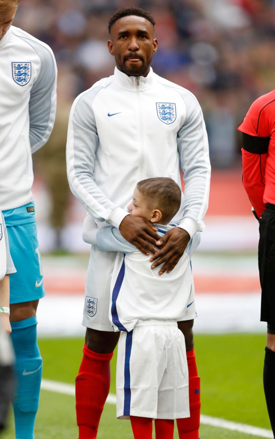 England's Jermain Defoe with mascot Bradley Lowery before the match - Credit: Reuters