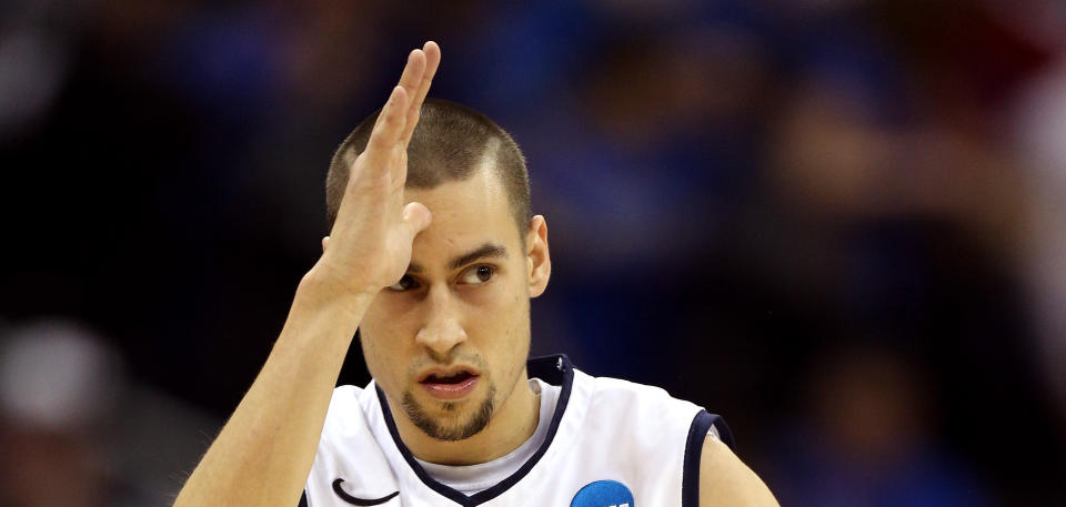 Former Ole Miss basketball player Marshall Henderson does the Landshark hand gesture. (Getty)