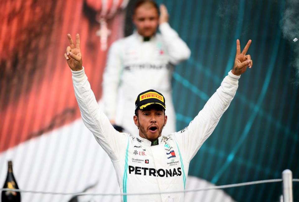 MEXICO CITY, MEXICO - OCTOBER 27: Race winner Lewis Hamilton of Great Britain and Mercedes GP celebrates on the podium during the F1 Grand Prix of Mexico at Autodromo Hermanos Rodriguez on October 27, 2019 in Mexico City, Mexico. (Photo by Clive Mason/Getty Images)