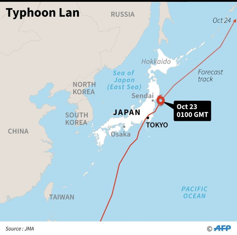 Map of Japan showing the forecast track of a typhoon that left at least two dead on Monday