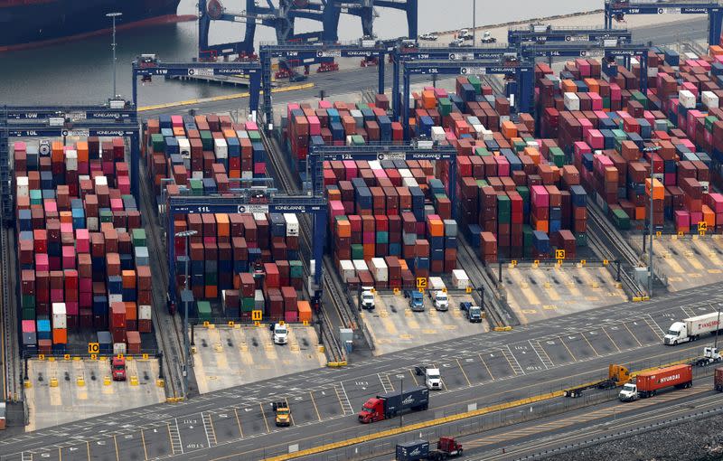 FILE PHOTO: Hundreds of shipping containers are seen stacked at a pier at the Port of New York and New Jersey in Elizabeth, New Jersey, U.S.