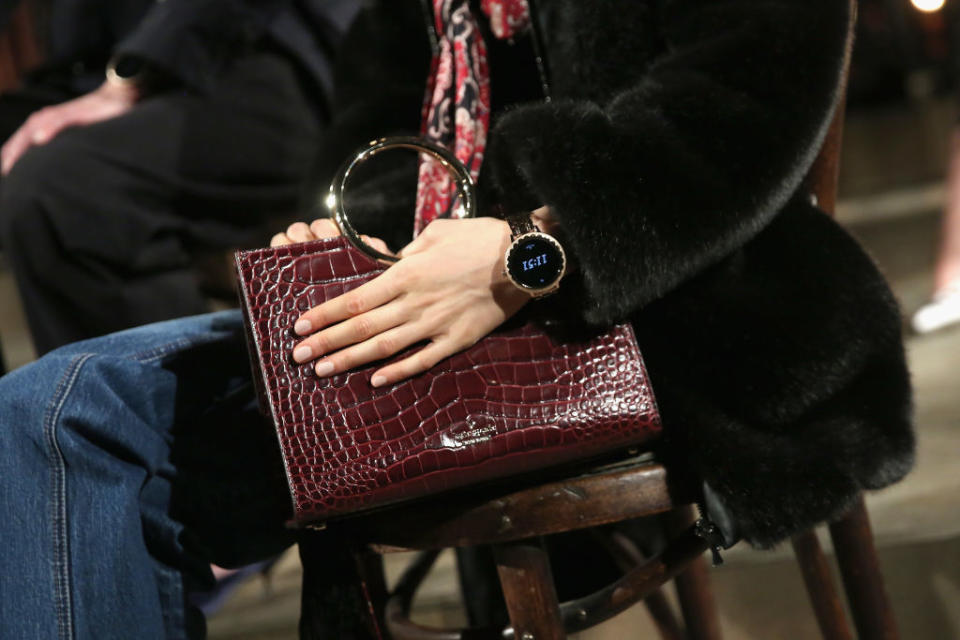 <p>A red, textured, circle hand tote from the Kate Spade FW18 show. (Photo: Getty Images) </p>