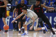 Air Force guard Caleb Morris, front, collides with San Diego State forward Matt Mitchell while pursuing the ball in the second half of an NCAA college basketball game Saturday, Feb. 8, 2020, at Air Force Academy, Colo. (AP Photo/David Zalubowski)