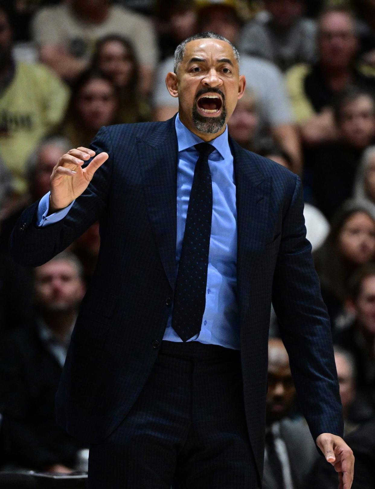 Michigan coach Juwan Howard yells toward his team during the first half on Tuesday, Jan. 23, 2024, in West Lafayette, Indiana.