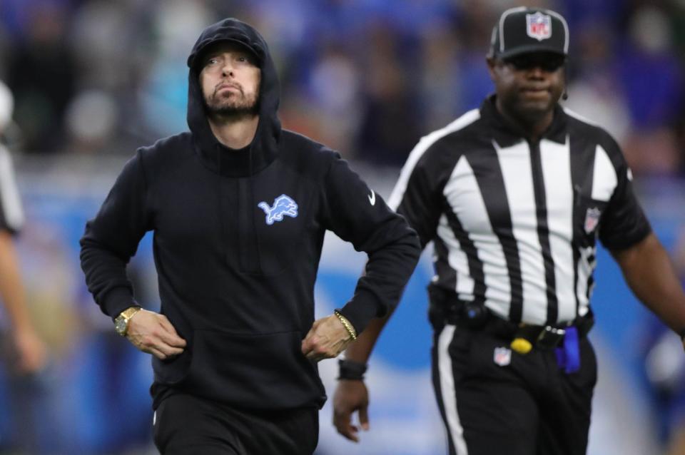 Eminem leaves the field after the coin toss before the Detroit Lions played against the New York Jets Monday, September 10, 2018, at Ford Field in Detroit, Mich.