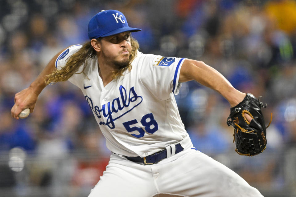 Kansas City Royals relief pitcher Scott Barlow throws against the Los Angeles Angels during the eighth inning of a baseball game, Monday, July 25, 2022, in Kansas City, Mo. (AP Photo/Reed Hoffmann)