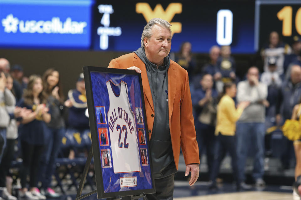 West Virginia coach Bob Huggins is honored during the first half of an NCAA college basketball game against Buffalo in Morgantown, W.Va., Sunday, Dec. 18, 2022. (AP Photo/Kathleen Batten)