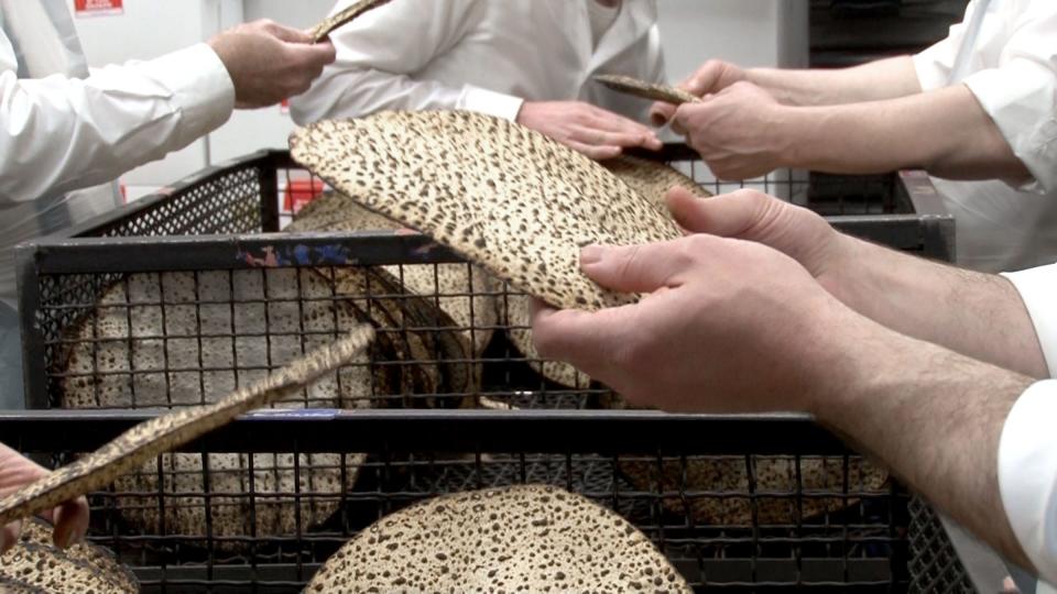 Matzoh is inspected at Lakewood Shmurah Matzoh Bakery in Lakewood Monday, April 1, 2023. Matzoh is central to Passover and in these weeks leading up to the holiday, things get unbelievably hectic here.