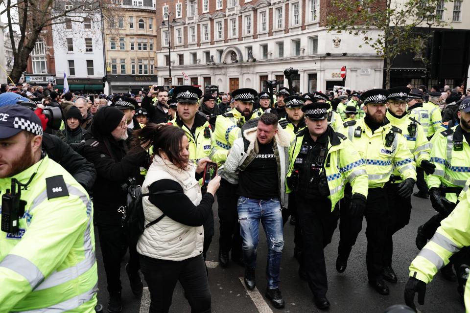 Several officers surrounded him (Jordan Pettitt/PA Wire)