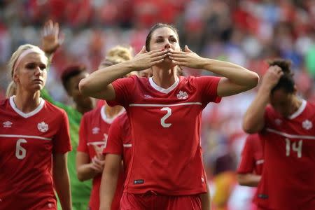 Vancouver, British Columbia, CAN; Canada defender Emily Zurrer (2) reacts after losing to England in the quarterfinals of the FIFA 2015 Women's World Cup at BC Place Stadium. England won 2-1, Jun 27, 2015. Matt Kryger-USA TODAY Sports