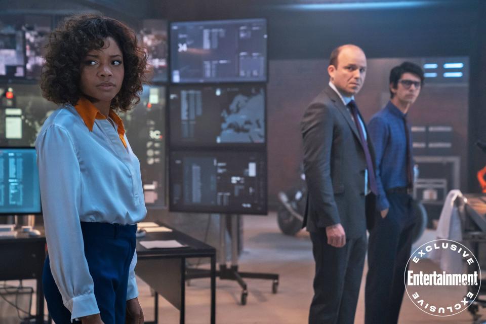 Naomie Harris as Eve Moneypenny, Rory Kinnear as Tanner, and Ben Whishaw as Q.