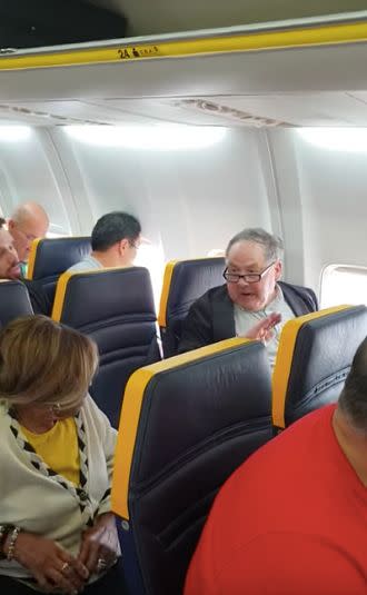 In the video, the white man berates the elderly black woman sitting one seat away from him. (Photo: David Lawrence/Facebook)