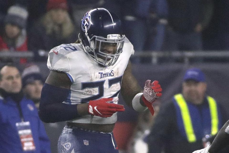 Tennessee Titans running back Derrick Henry celebrates his touchdown against the New England Patriots in the first half of an NFL wild-card playoff football game, Saturday, Jan. 4, 2020, in Foxborough, Mass. (AP Photo/Elise Amendola)