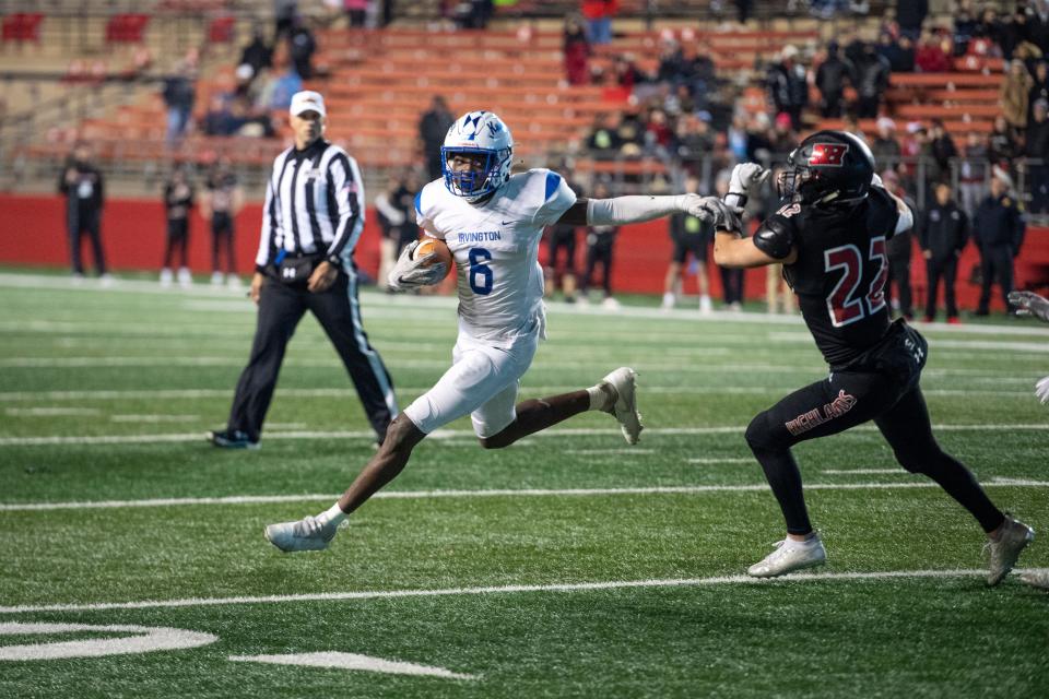 Northern Highlands vs. Irvington in the North, Group 4 regional championship football game at Rutgers SHI Stadium on Saturday, December 4, 2021. I #6 Famah Toure avoids a tackle in the fourth quarter. 