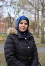 Samia Omar, a chaplain at Harvard University, poses for a portrait at Harvard Yard in Cambridge, Mass., Nov. 30, 2021. Omar and her husband, Imam Khalil Abdur-Rashid, who co-founded The Islamic Seminary of America together and now serve as Harvard’s Muslim chaplains, offer programming and mentoring for Muslim students on campus. (Aysha Khan/Religion News Service via AP)