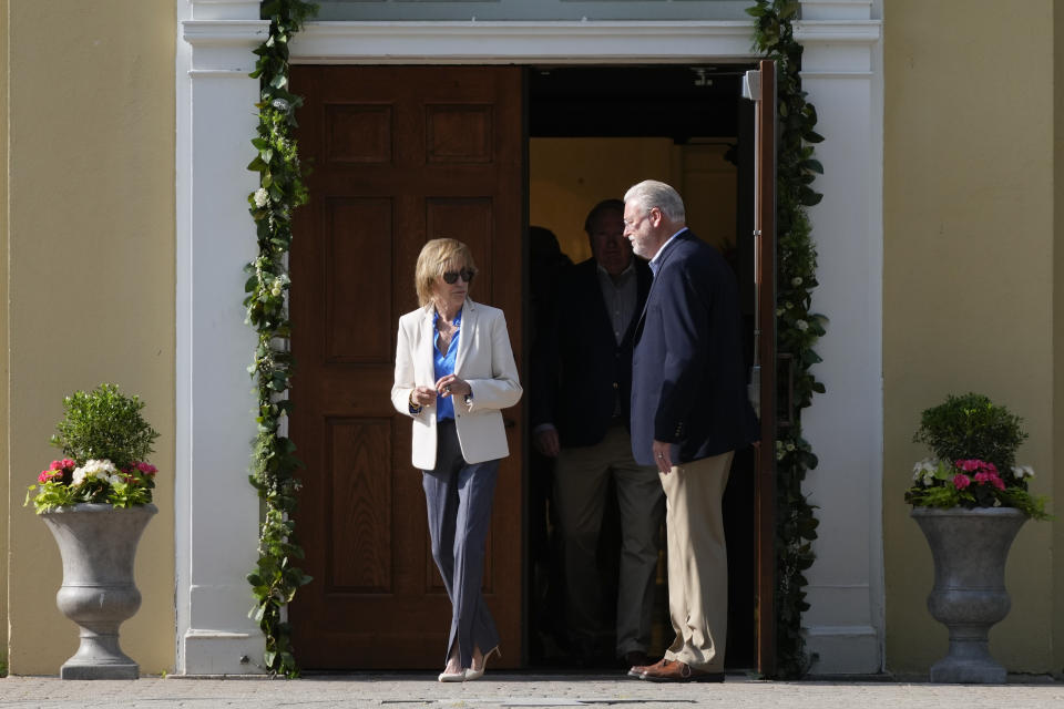 Valerie Biden Owens, left, sister of President Joe Biden, walks to the grave of the president's late son, Beau Biden, as she and members of the Biden family depart a memorial mass at St. Joseph on the Brandywine Catholic Church in Wilmington, Del., Tuesday, May 30, 2023. Beau Biden died of brain cancer at age 46 in 2015. (AP Photo/Patrick Semansky)