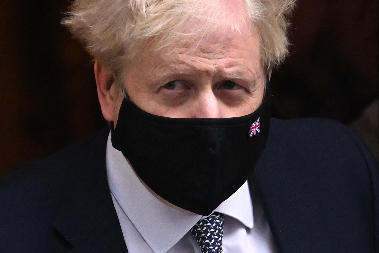 LONDON, ENGLAND - JANUARY 12:  Prime Minister Boris Johnson leaves 10 Downing Street For PMQ's on January 12, 2022 in London, England. (Photo by Leon Neal/Getty Images)