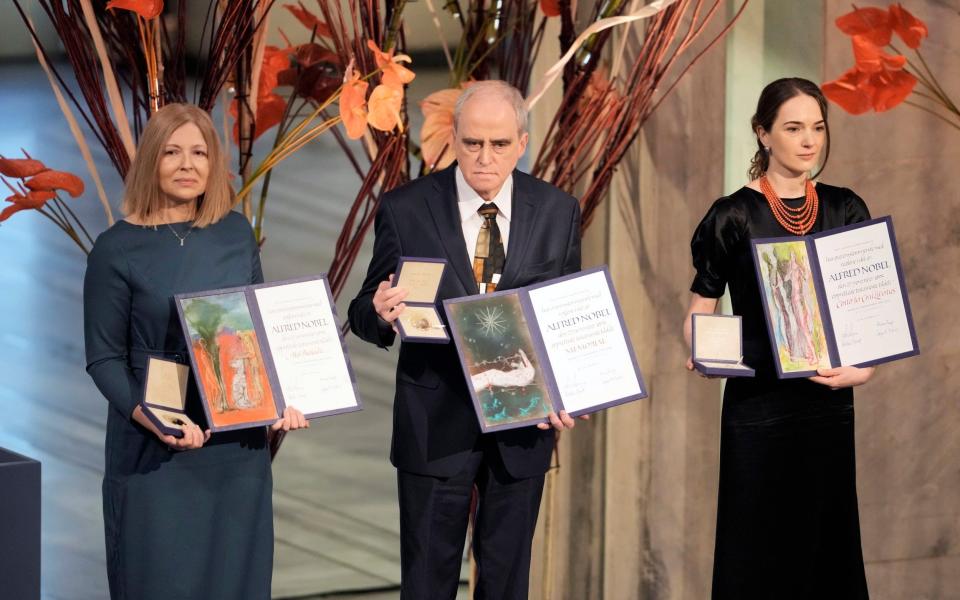 The representatives of the winning organisations display their awards - AP Photo/ Markus Schreiber