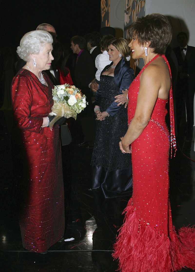 <p>Queen Elizabeth and singer Shirley Bassey had a major twinning moment while backstage at the Royal Variety Performance. Red is really both of their colors! </p>