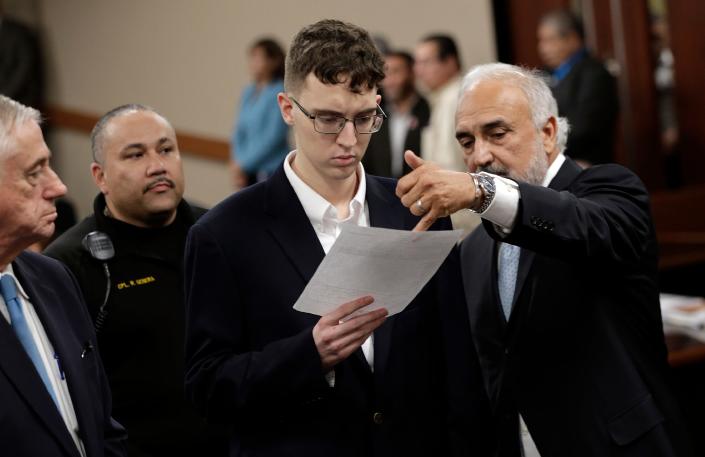 Accused El Paso Walmart mass shooter Patrick Crusius is arraigned Thursday, October, 10, 2019 in the 409th state District Court with Judge Sam Medrano presiding. The gunman, 21-year-old at the time , has now pleaded guilty to killing 23 and injuring 25 in the Aug. 3 mass shooting at an El Paso Walmart in the seventh deadliest mass shooting in modern U.S. history and third deadliest in Texas. The gunman is shown with his  attorneys Mark Stevens and Joe Spencer.