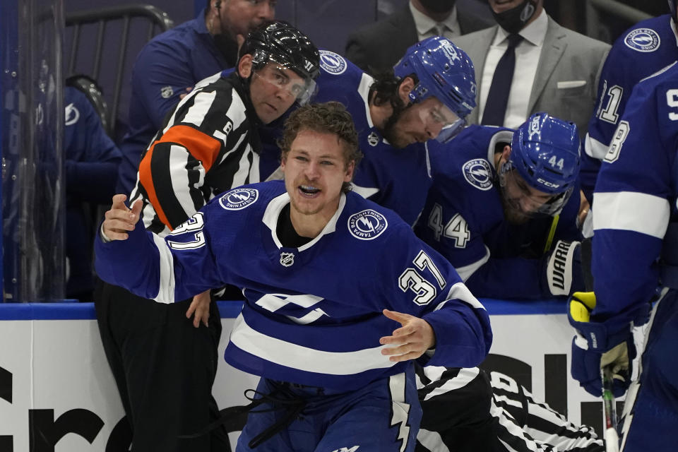 Tampa Bay Lightning center Yanni Gourde (37) reacts after getting into a fight with New York Islanders right wing Leo Komarov during the third period in Game 2 of an NHL hockey Stanley Cup semifinal playoff series Tuesday, June 15, 2021, in Tampa, Fla. (AP Photo/Chris O'Meara)