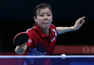 "Try not to look too cross-eyed" <br> LONDON, ENGLAND - JULY 29: Ariel Hsing of the United States plays a forehand in her Women's Singles second round match against Lian Xia Ni of Luxembourg on Day 2 of the London 2012 Olympic Games at ExCeL on July 29, 2012 in London, England. (Photo by Feng Li/Getty Images)