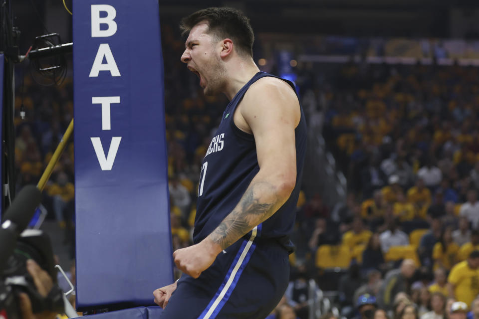 Dallas Mavericks guard Luka Doncic reacts against the Golden State Warriors during the first half of Game 2 of the NBA basketball playoffs Western Conference finals in San Francisco, Friday, May 20, 2022. (AP Photo/Jed Jacobsohn)