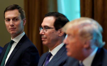 U.S. President Donald Trump, seated with White House senior adviser Jared Kushner (L) and Treasury Secretary Steve Mnuchin (C), speaks during his meeting with the Emir of Kuwait Sheikh Sabah al-Ahmad al-Jaber al-Sabah at the White House in Washington, U.S., September 5, 2018. REUTERS/Kevin Lamarque