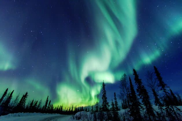 Iceland and Canada both offer prime views of the Northern Lights during the winter months. (Photo: Vincent Demers Photography via Getty Images)