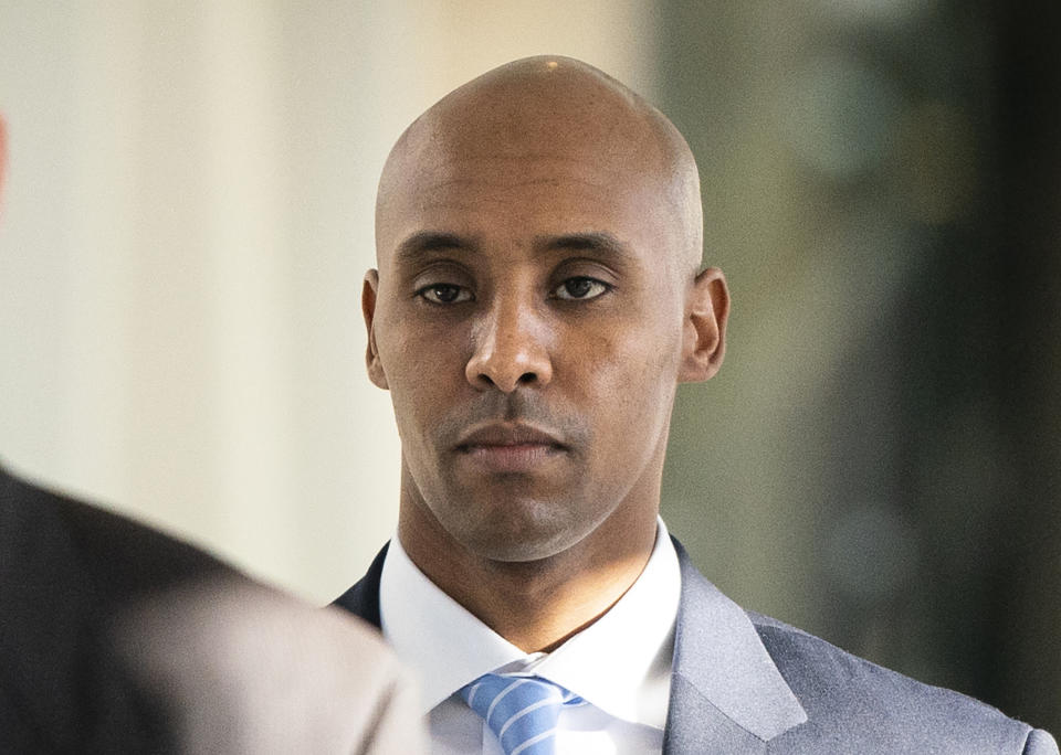 FILE - In this Friday, April 26, 2019, file photo, former Minneapolis police officer Mohamed Noor walks to court in Minneapolis. On Tuesday, April 30m 2019, a jury of 10 men and two women found Noor guilty of third-degree murder but acquitted of the more serious second-degree intentional murder. He also was convicted of manslaughter in the 2017 death of an unarmed Justine Ruszczyk Damond, a dual citizen of the U.S. and Australia. (Leila Navidi/Star Tribune via AP, File)