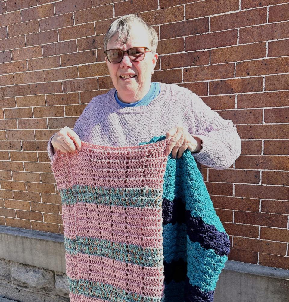 Lois Toensing crochets hats, gloves, scarves and blankets, just to give them all away. Most of what she creates is donated to local nonprofits that provide warm clothing to those in need.