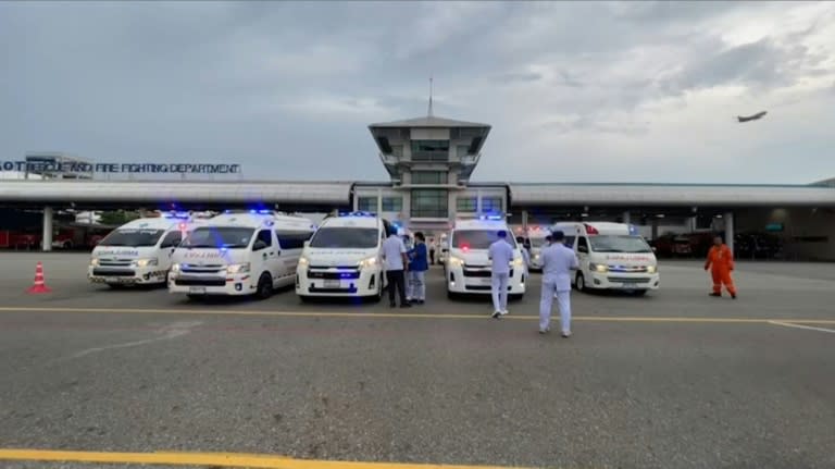 Medical staff gather at Suvarnabhumi Airport in Bangkok after a Singapore Airlines flight hit severe turbulence and was forced to make an emergency landing (Candida NG)