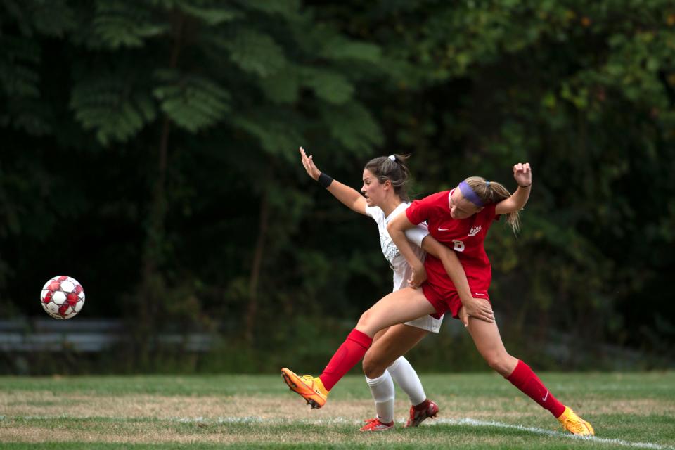 Pennridge forward Tori Angelo and Neshaminy defender Carly Hock-Smith battle at Neshaminy High School on Tuesday, Sept. 20, 2022. The Skins defeated the Rams at home 2-1.