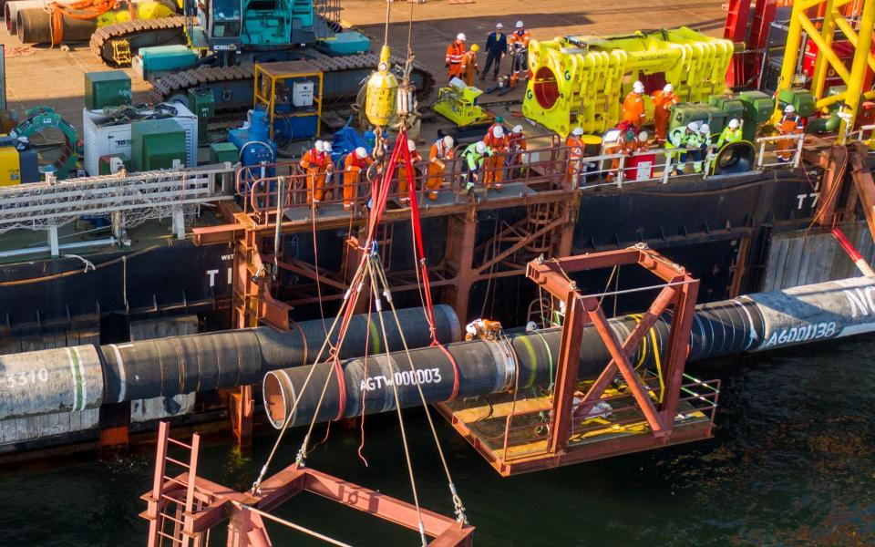 Specialists perform an above-water tie-in while finishing the construction of the Nord Stream 2 pipeline in the Baltic Sea - Reuters