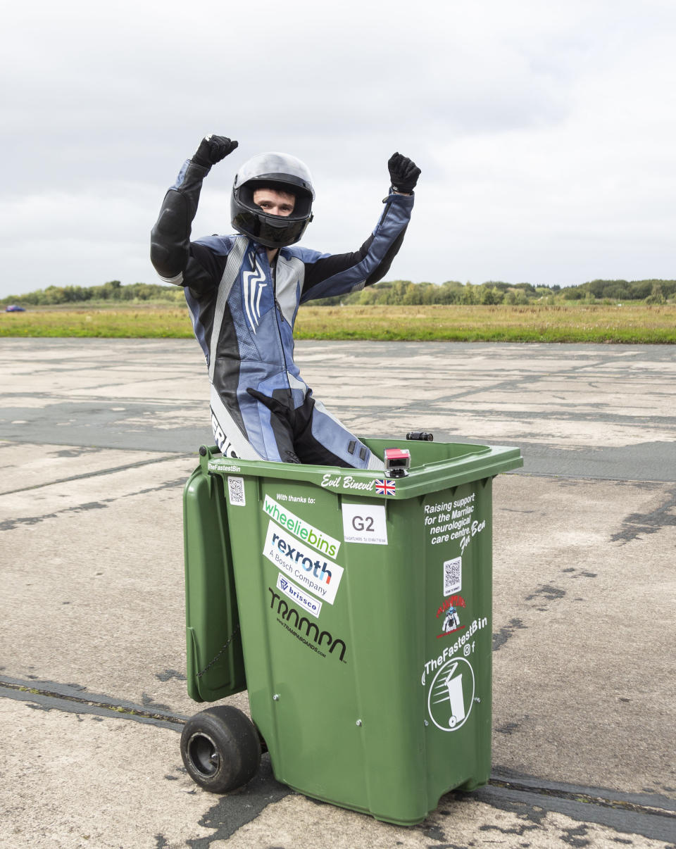 Wacky design engineer sets new Guinness World Record after reaching speeds of over 40mph - in a WHEELIE BIN