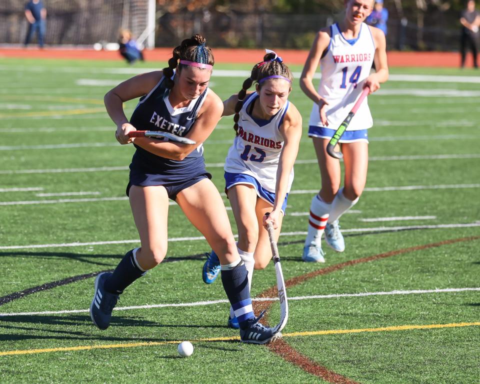 Exeter's Addison MacNeil winds up for a shot in last month's Division I field hockey championship game against Winnacunnet. MacNeil was named Division I Offensive Player of the Year.