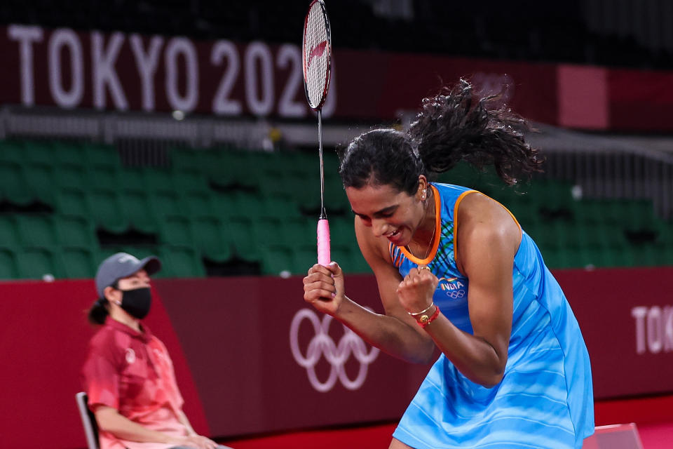 CHOFU, JAPAN - AUGUST 01: Pusarla V. Sindhu of Team India celebrates as she wins against He Bing Jiao of Team China during the Women’s Singles Bronze Medal match on day nine of the Tokyo 2020 Olympic Games at Musashino Forest Sport Plaza on August 01, 2021 in Chofu, Tokyo, Japan. (Photo by Lintao Zhang/Getty Images)