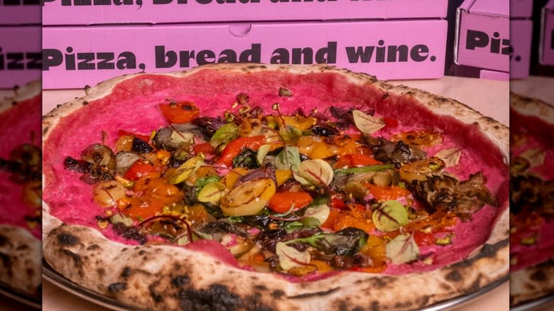 Veggie pizza with pink sauce